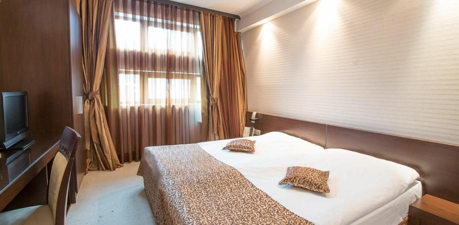 Spa Hotel Persenk เดวิน ห้อง รูปภาพ A bedroom at the hotel